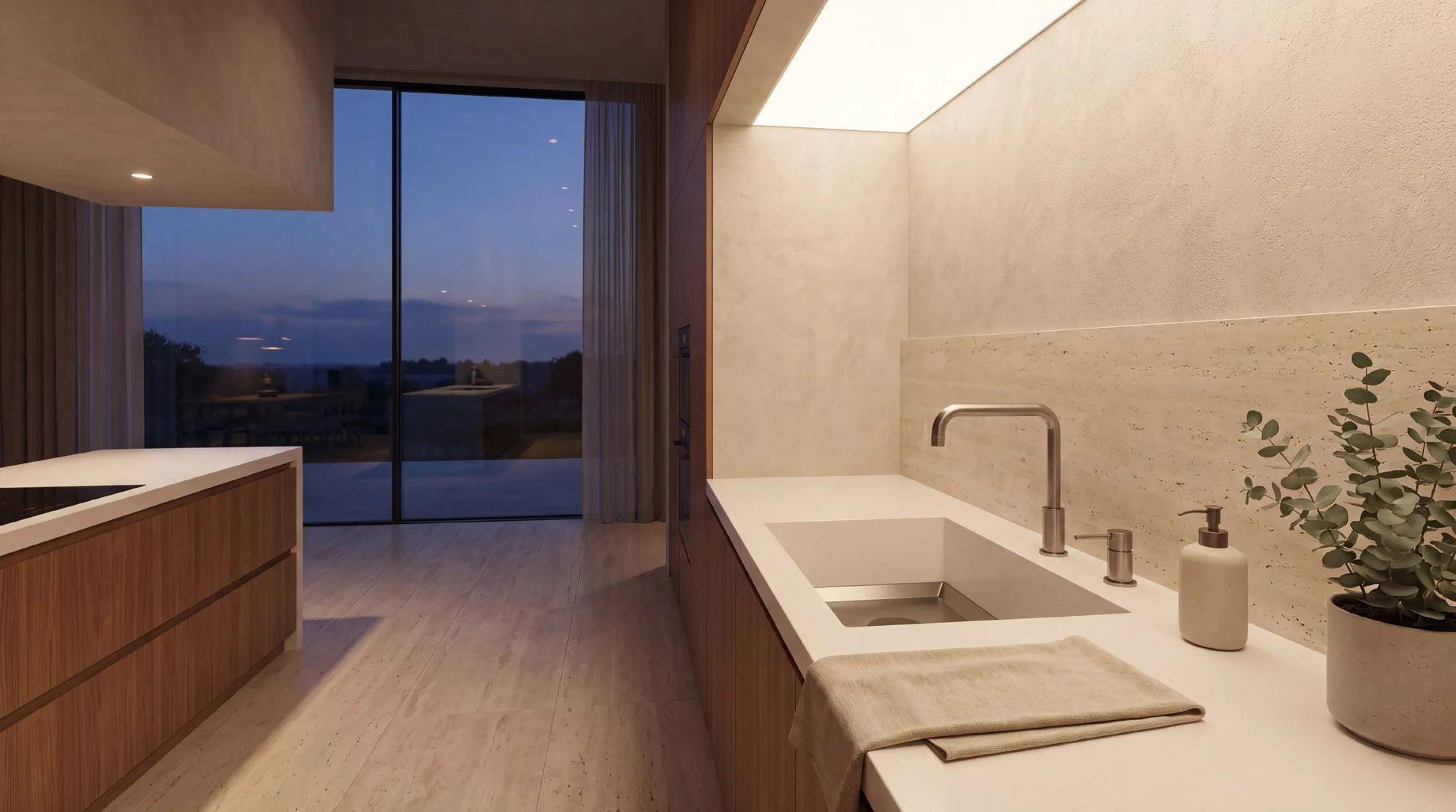 Kitchen with an ALBELA DUAL sink and hood against a floor-to-ceiling window at dusk